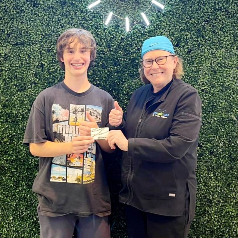 A patient at South Surrey Smiles has completed their braces treatment and is ready for retainers.